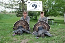 Dan (L) with his two big toms he took on an evening hunt. The one tom had 2 beards, longest being 10